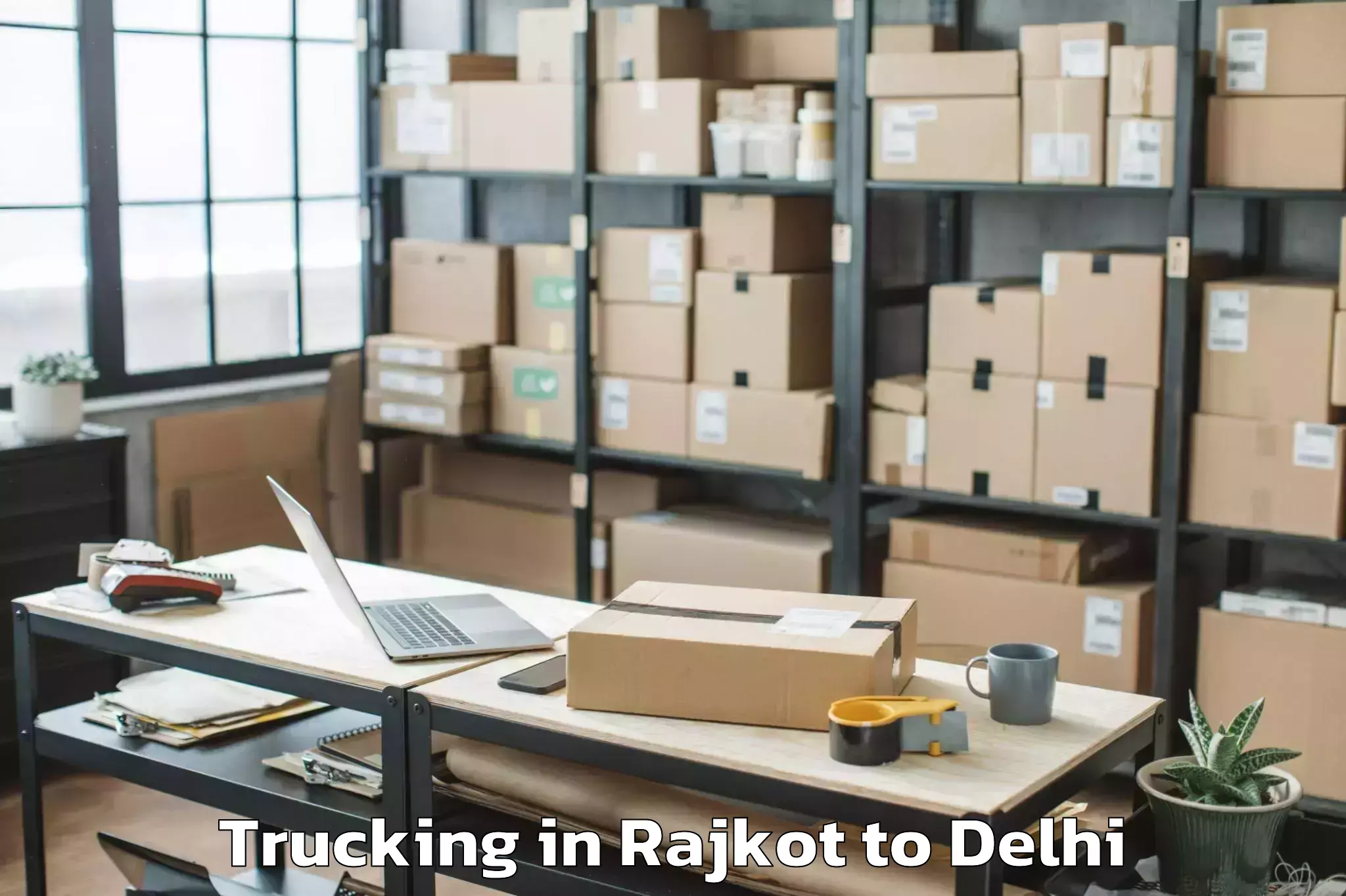 Book Your Rajkot to Indraprastha Institute Of Info Trucking Today